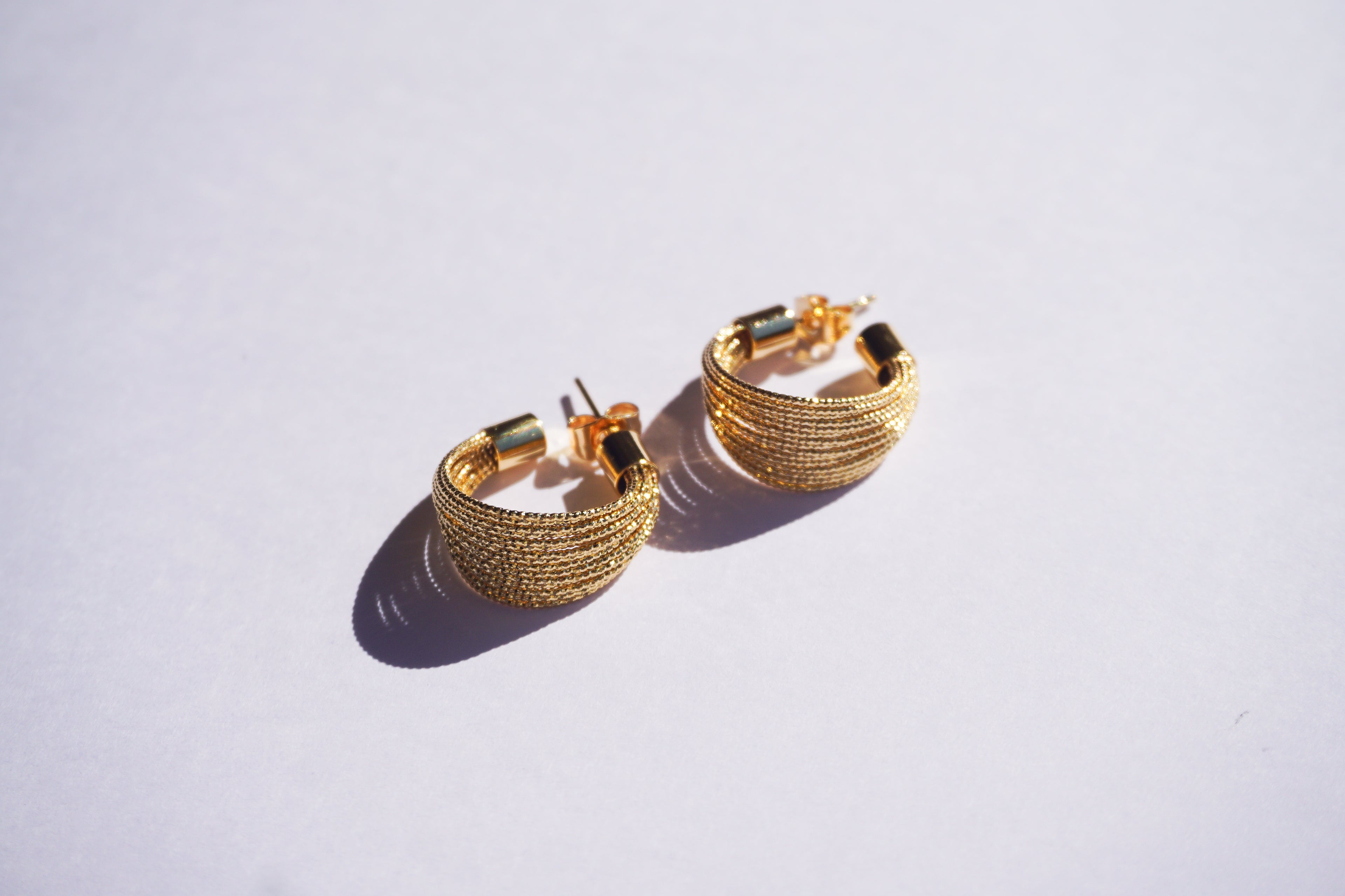 Aracada hilos con tope al final