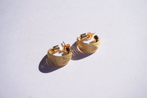 Aracada hilos con tope al final