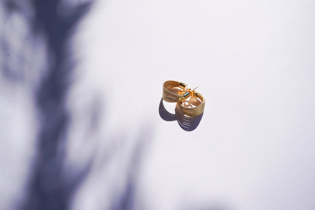 Aracada hilos con tope al final