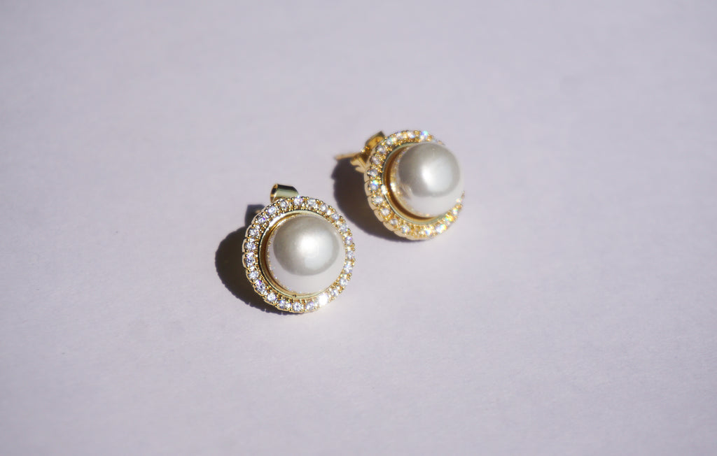 Broquel círculo zirconias y perla
