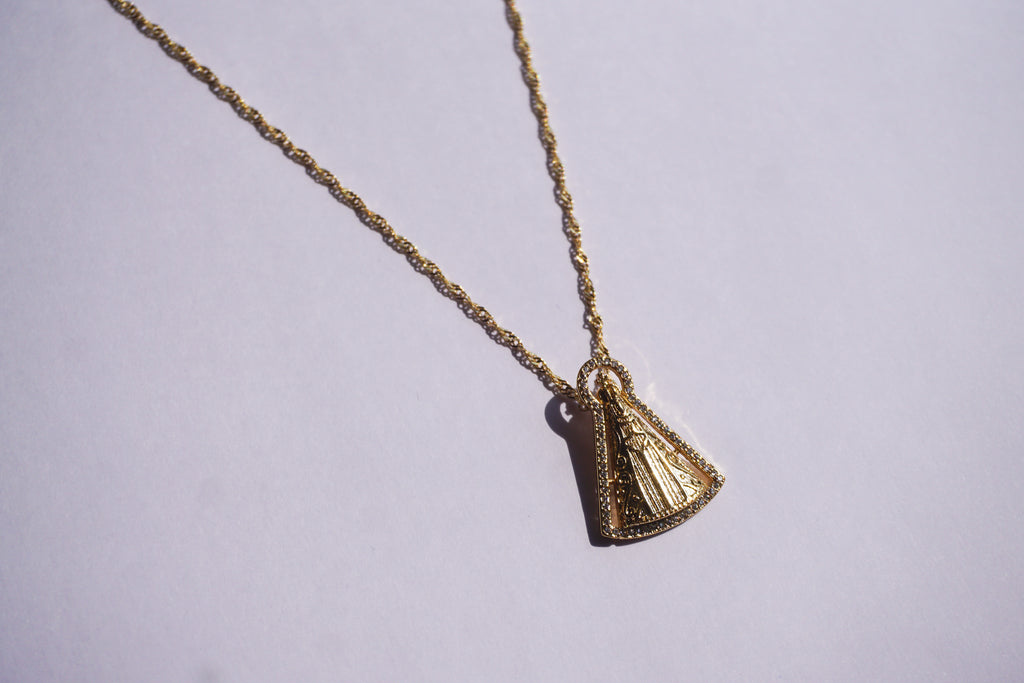Collar con dije de la Virgen