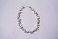 Collar perla y bolitas doradas