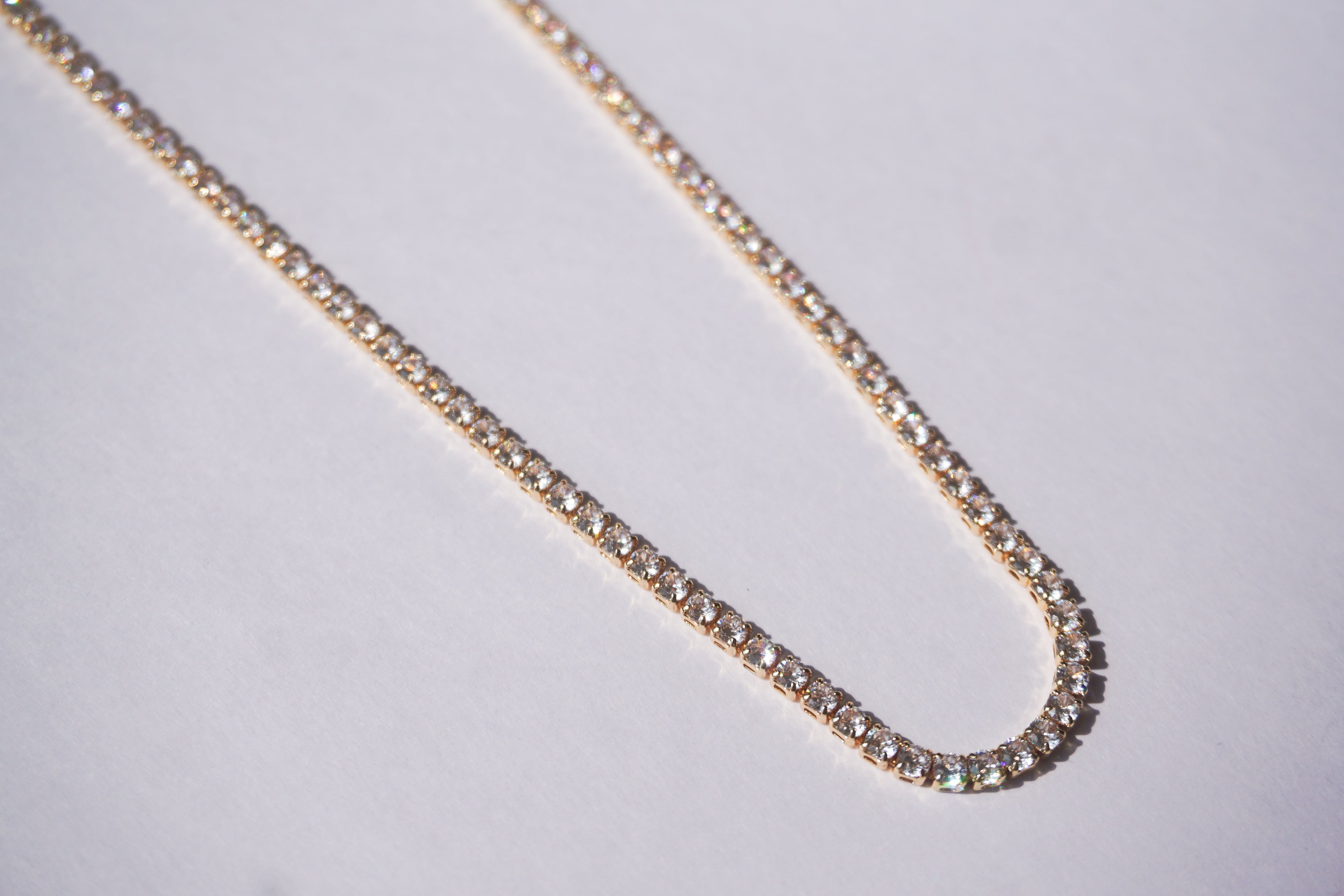 Chocker tennis dorado