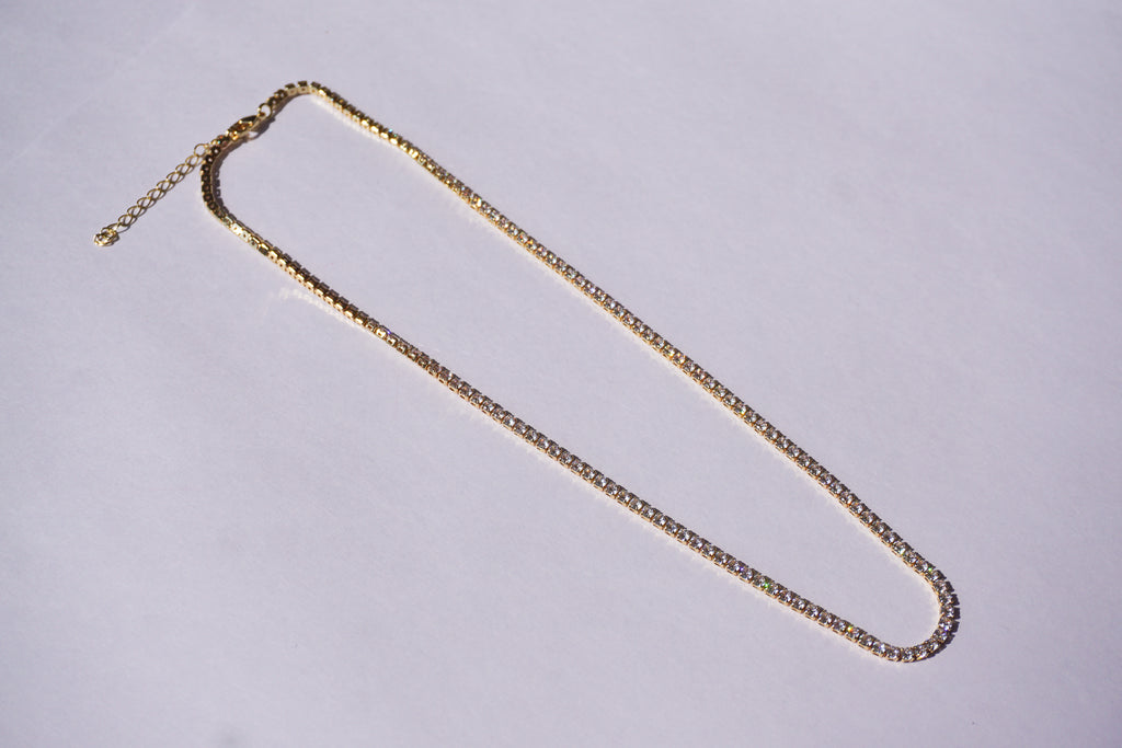 Chocker tennis dorado