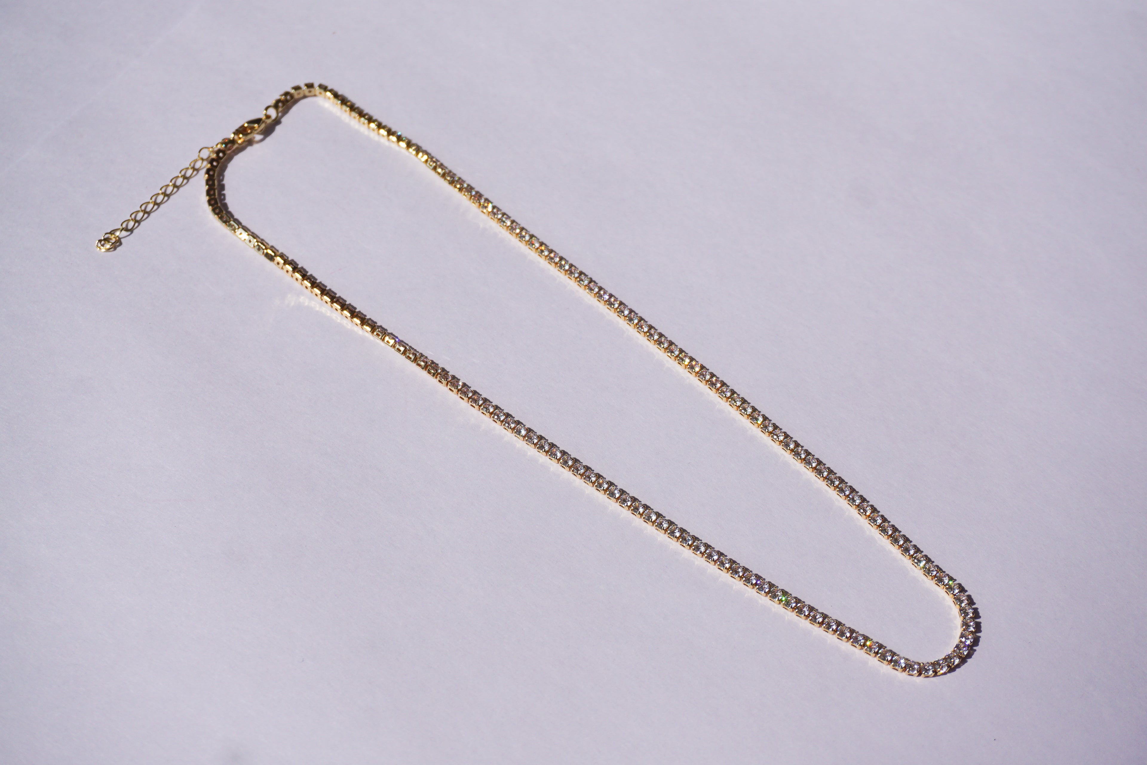 Chocker tennis dorado