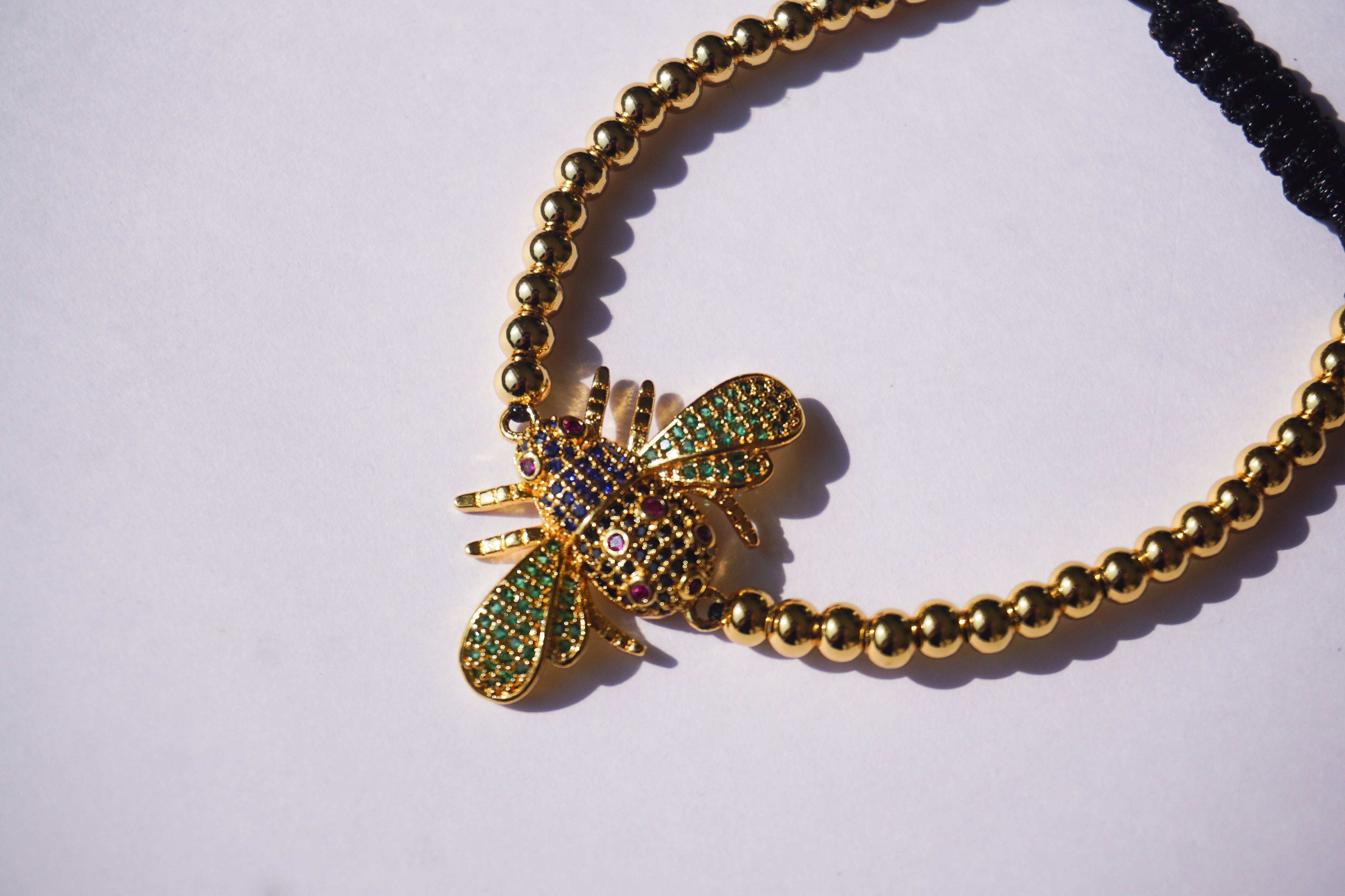 Pulsera dorada de insecto con cierre ajustable