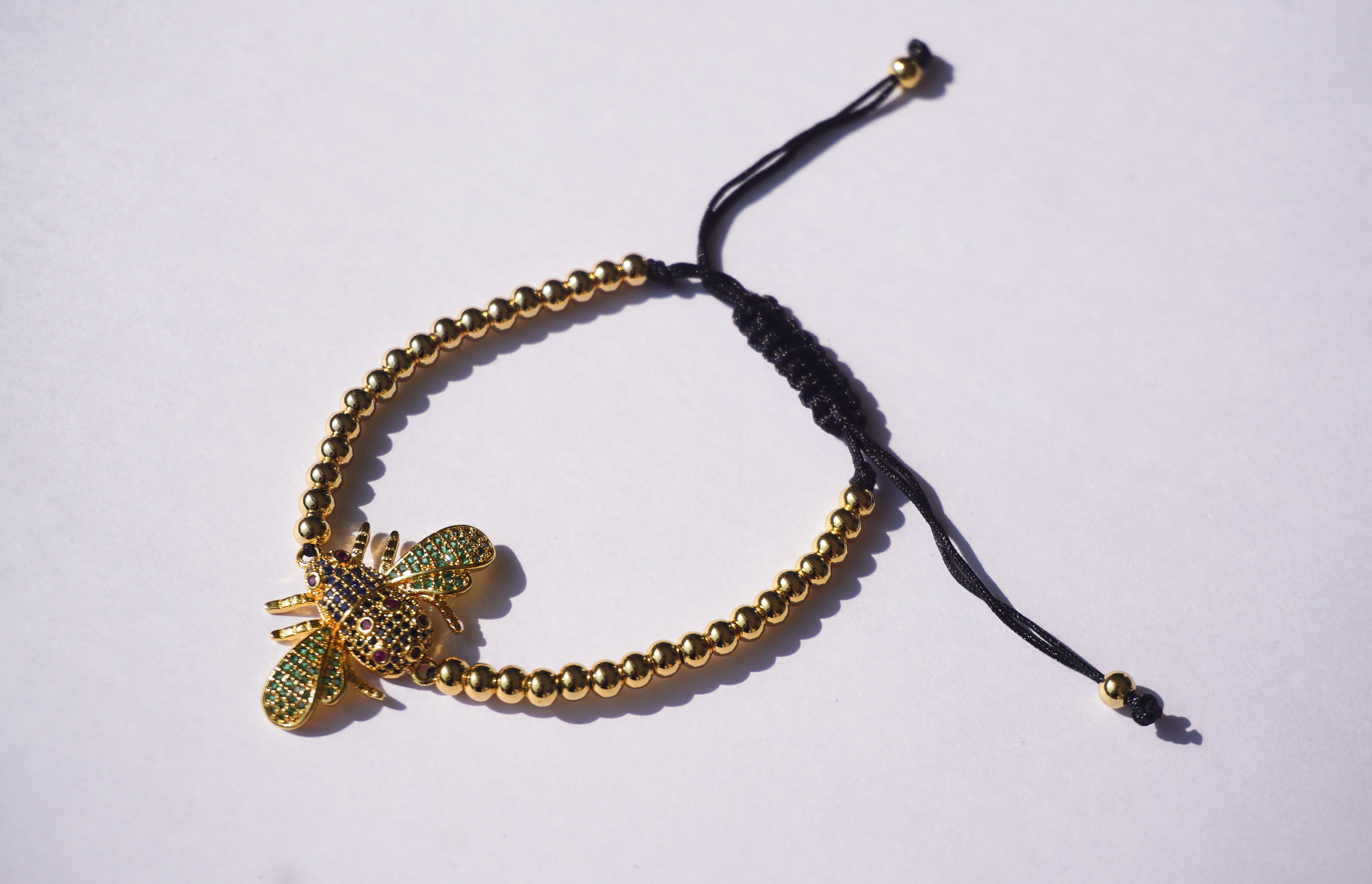 Pulsera dorada de insecto con cierre ajustable