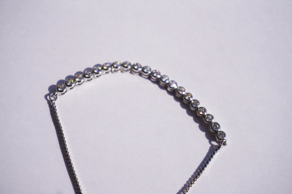 Pulsera tennis plateada con zirconias circulares
