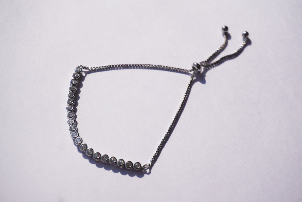 Pulsera tennis plateada con zirconias circulares