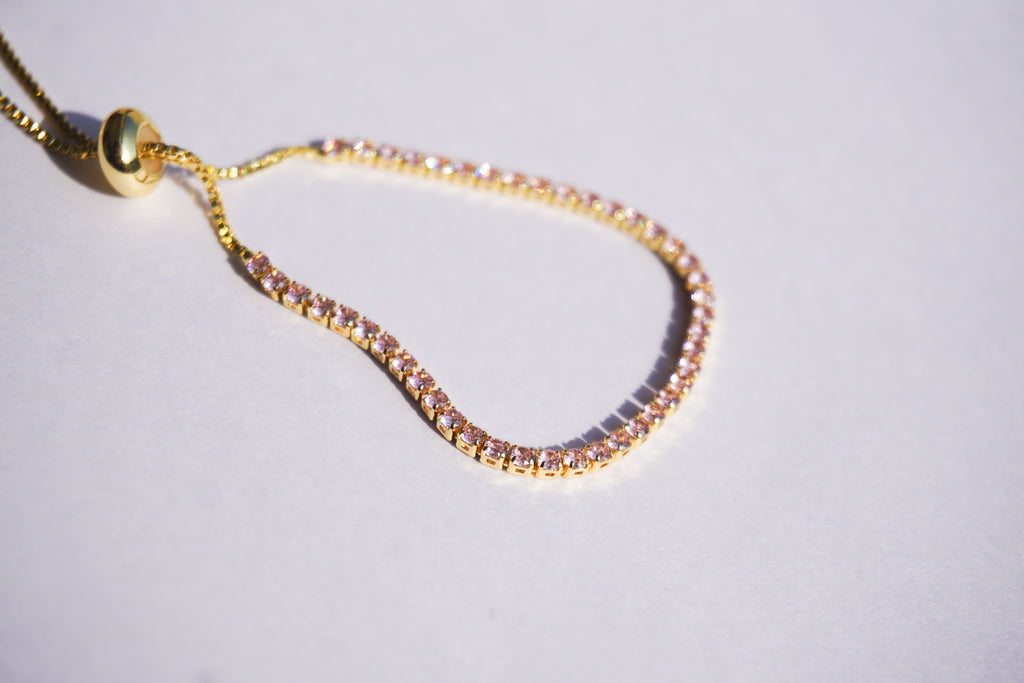 Pulsera tennis dorada con zirconias rosa pastel