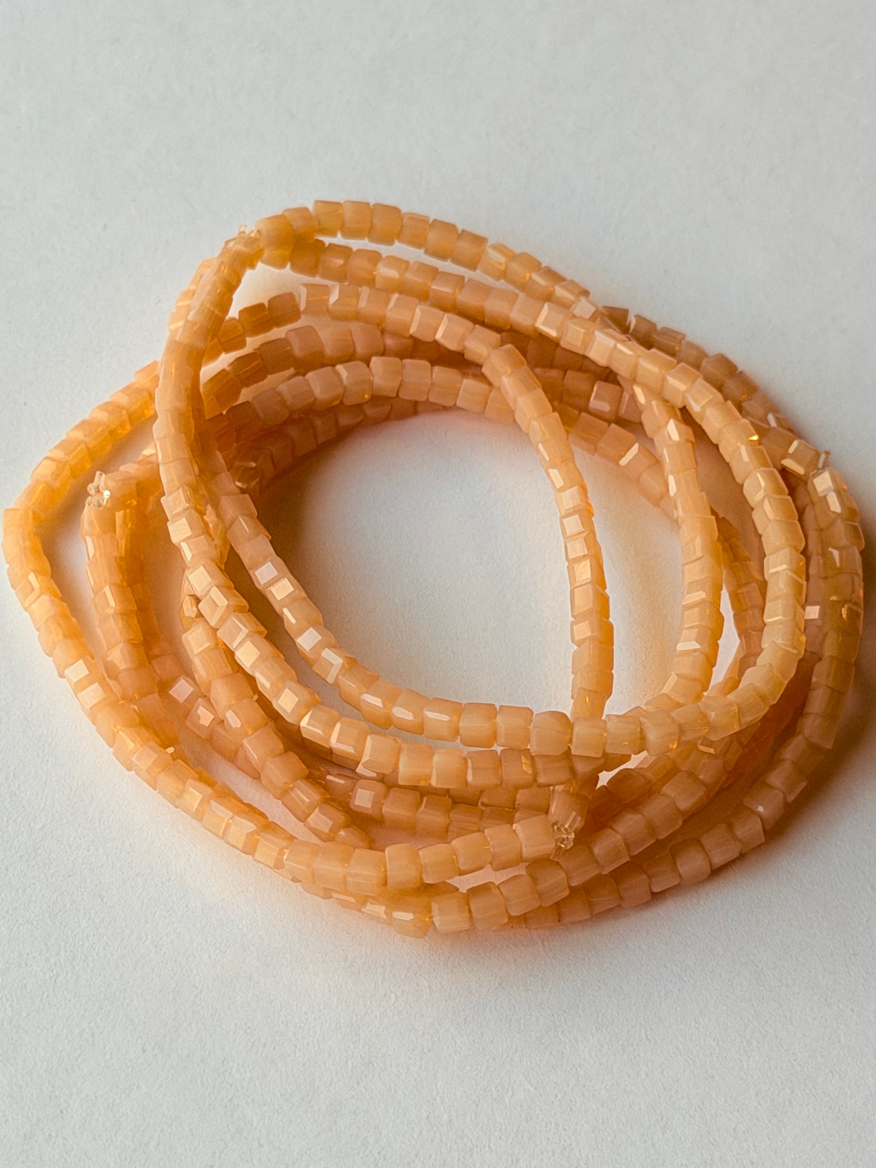 Pulsera de elástico nude