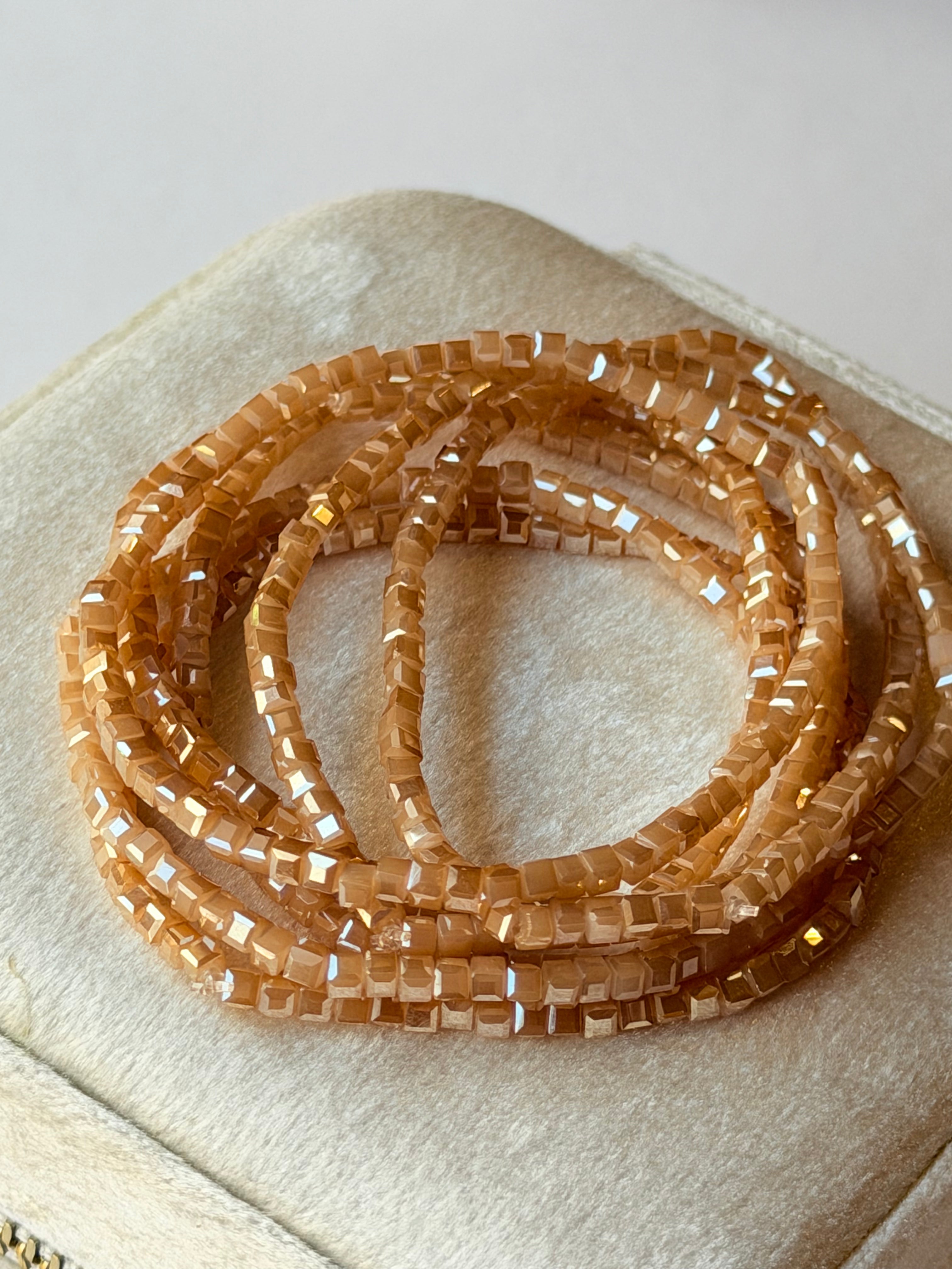 Pulsera de elástico nude