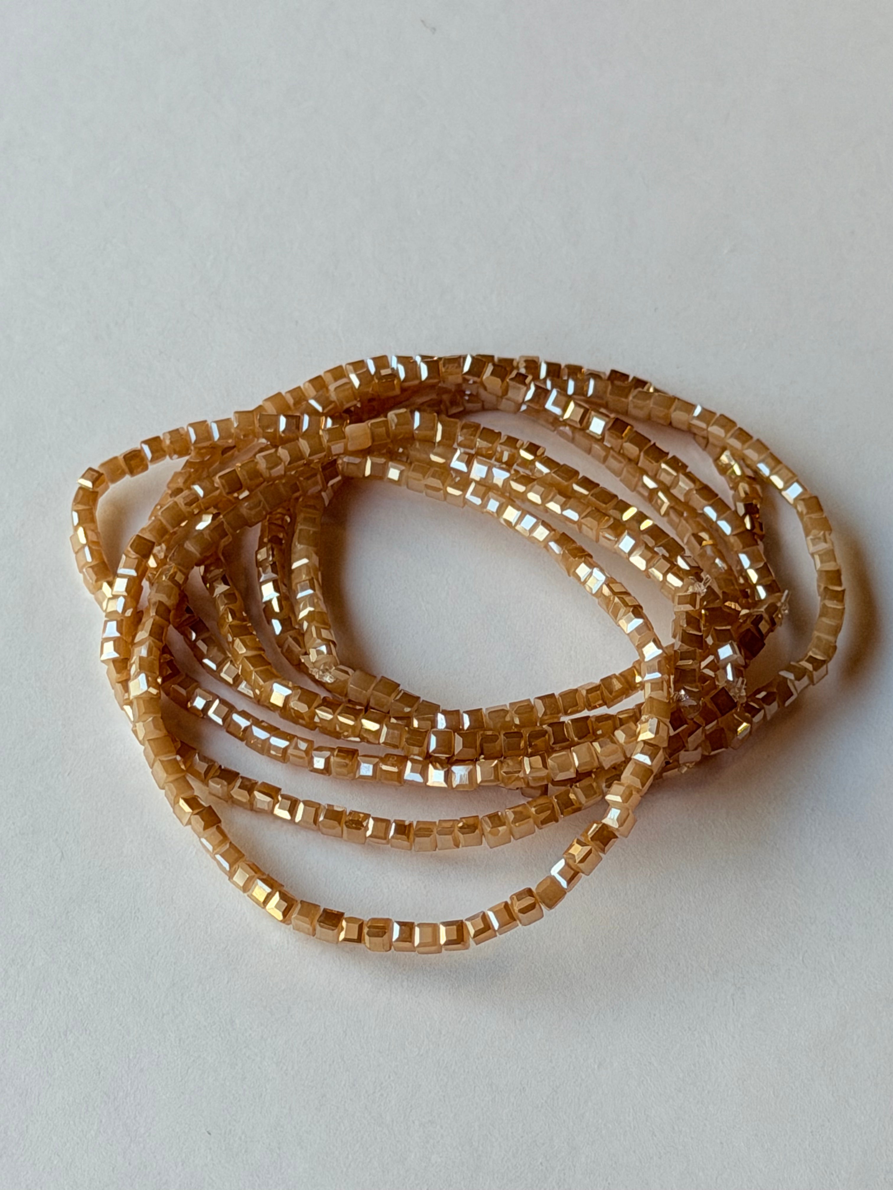 Pulsera de elástico nude