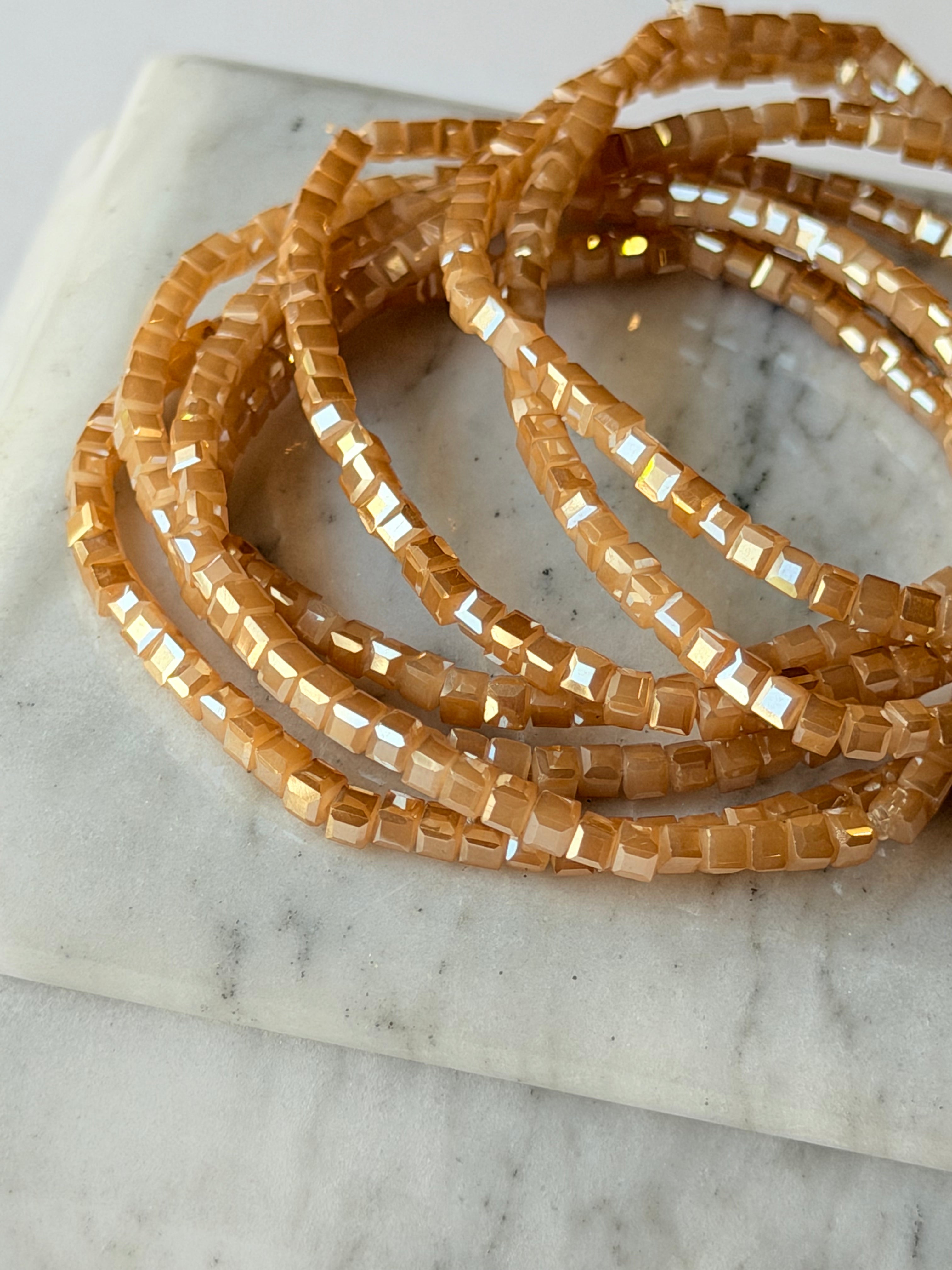Pulsera de elástico nude