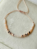 Pulsera de hilo con cristales y piedras facetadas