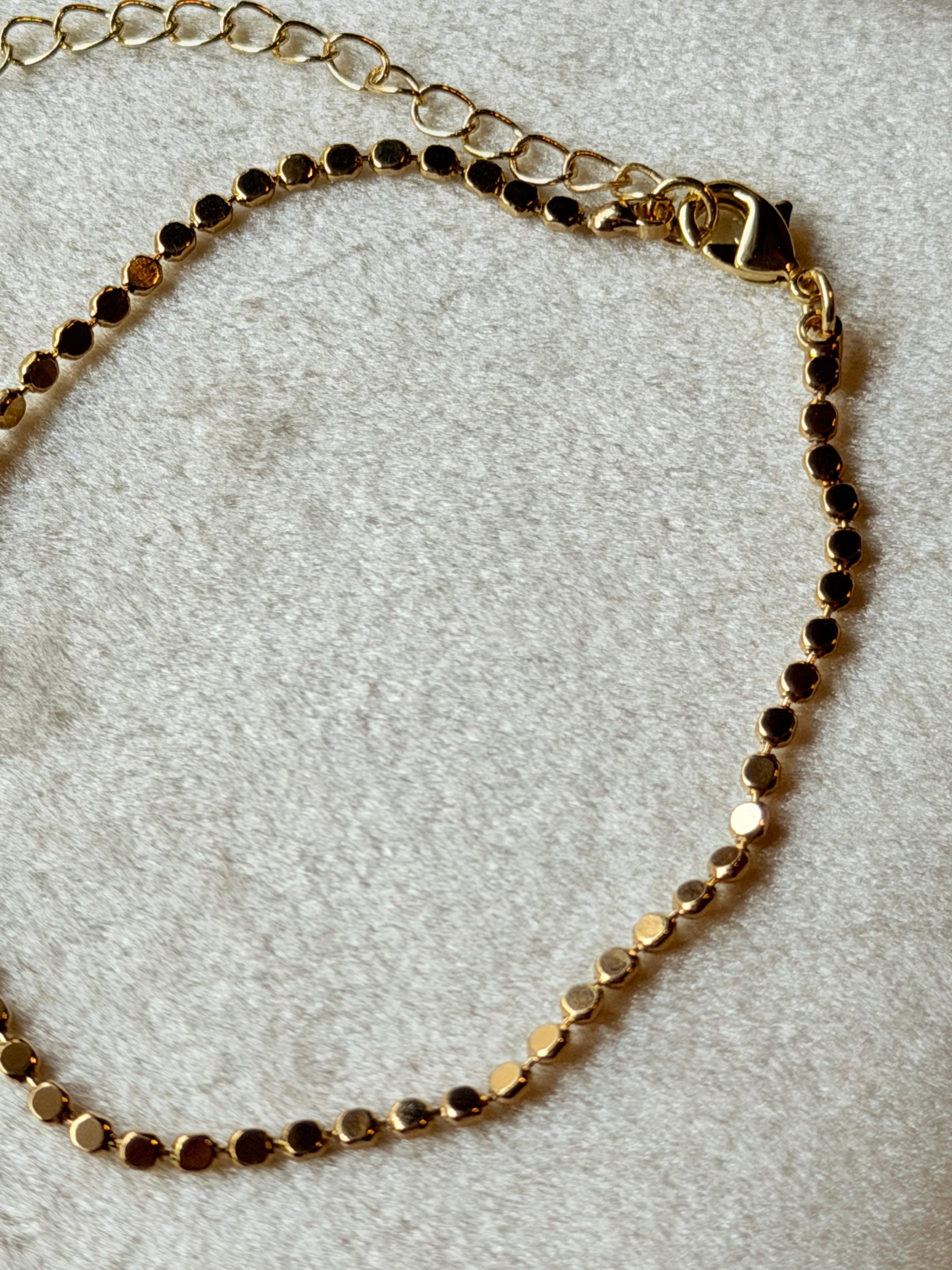 Pulsera de bolita aplastada