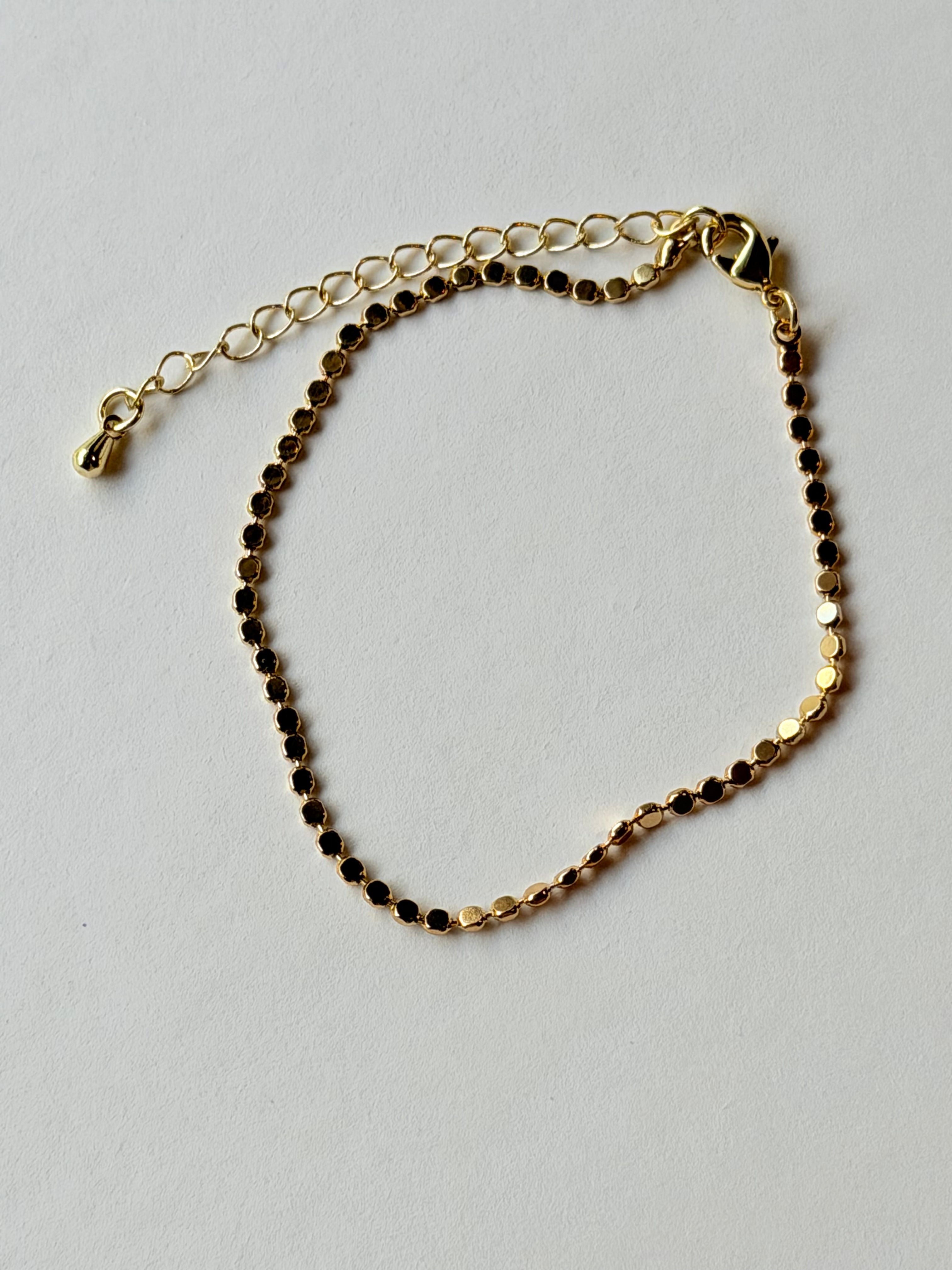 Pulsera de bolita aplastada