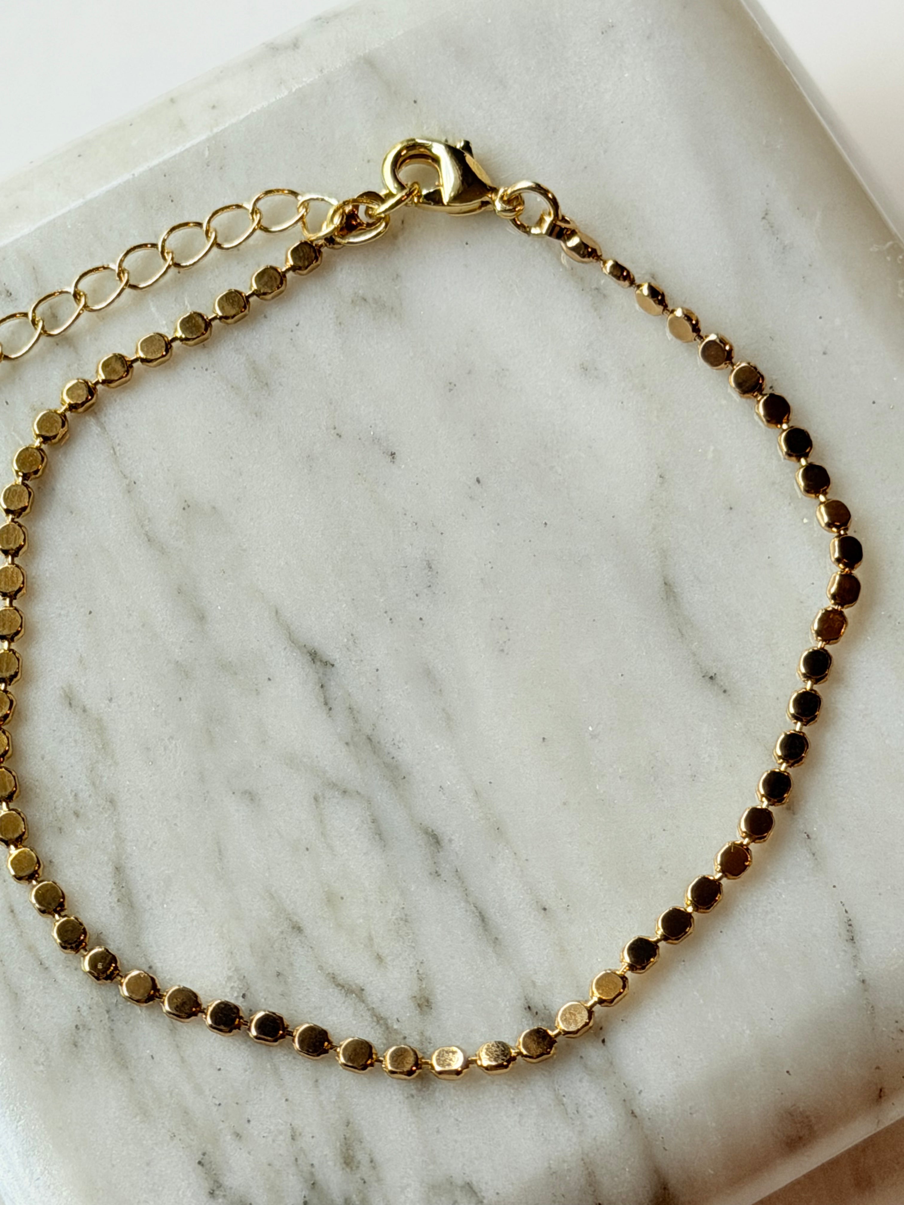 Pulsera de bolita aplastada