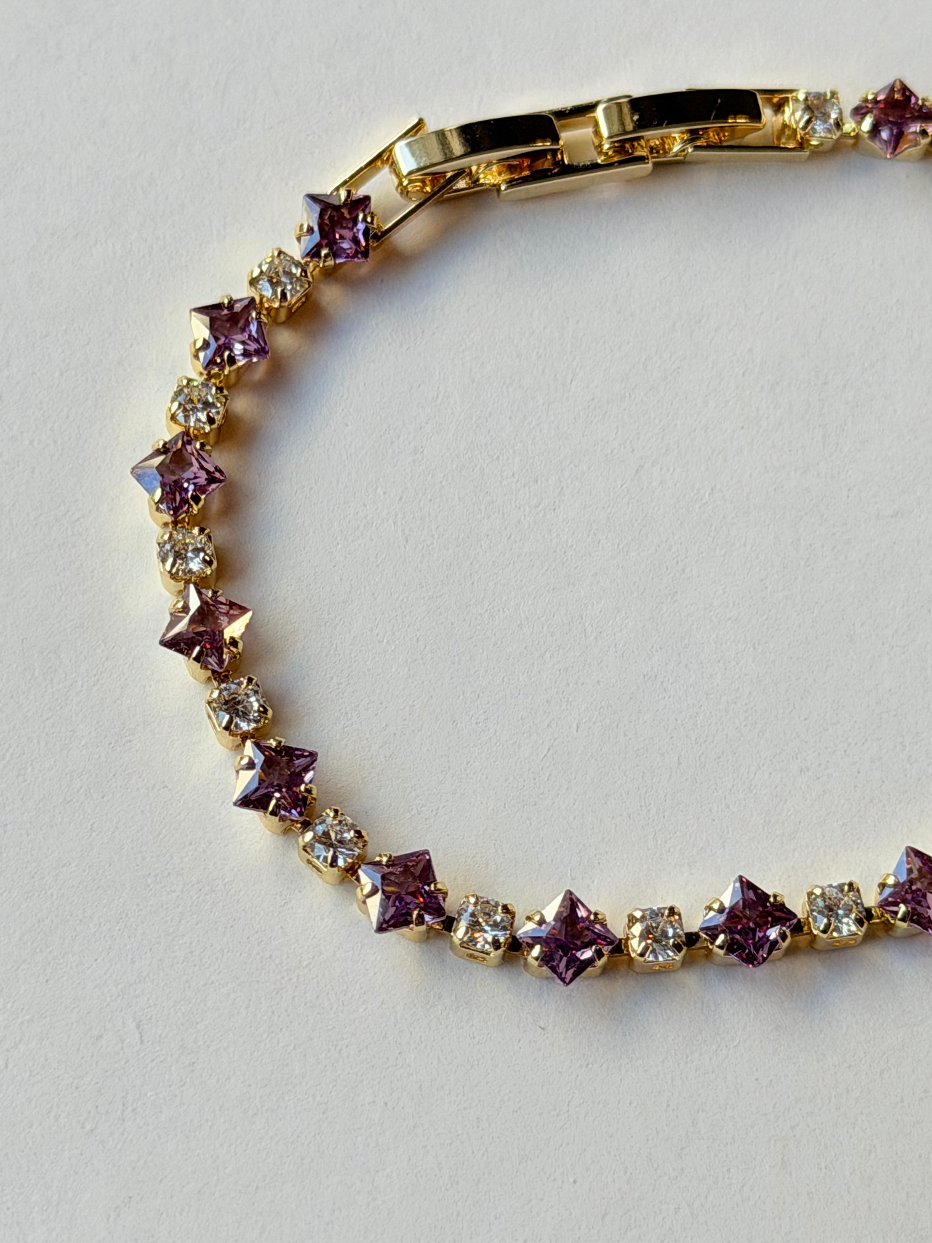 Pulsera tennis con zirconias lilas y transparentes