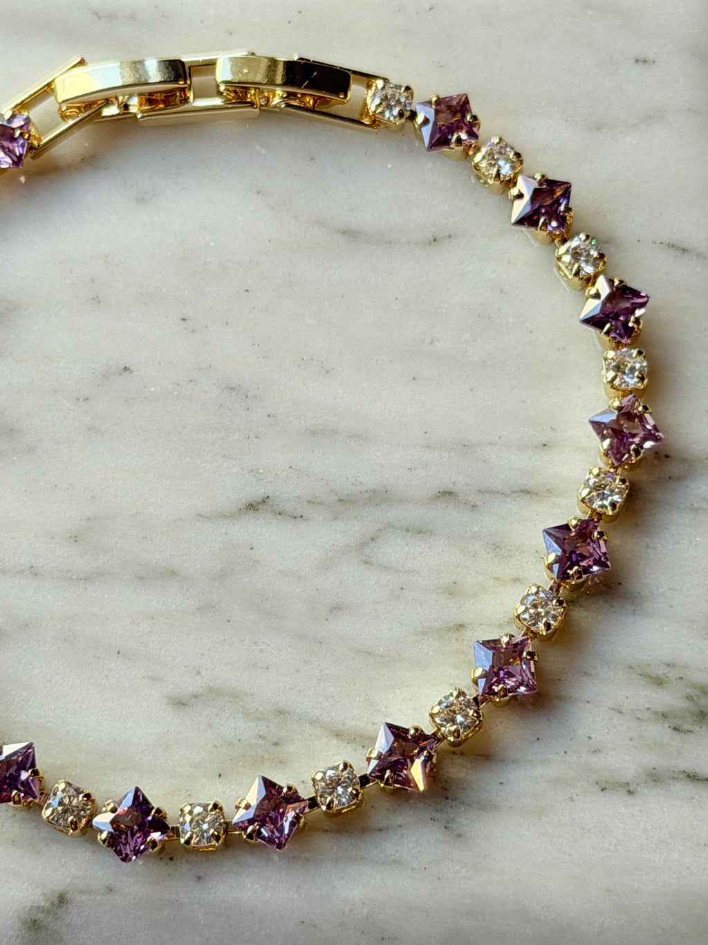 Pulsera tennis con zirconias lilas y transparentes