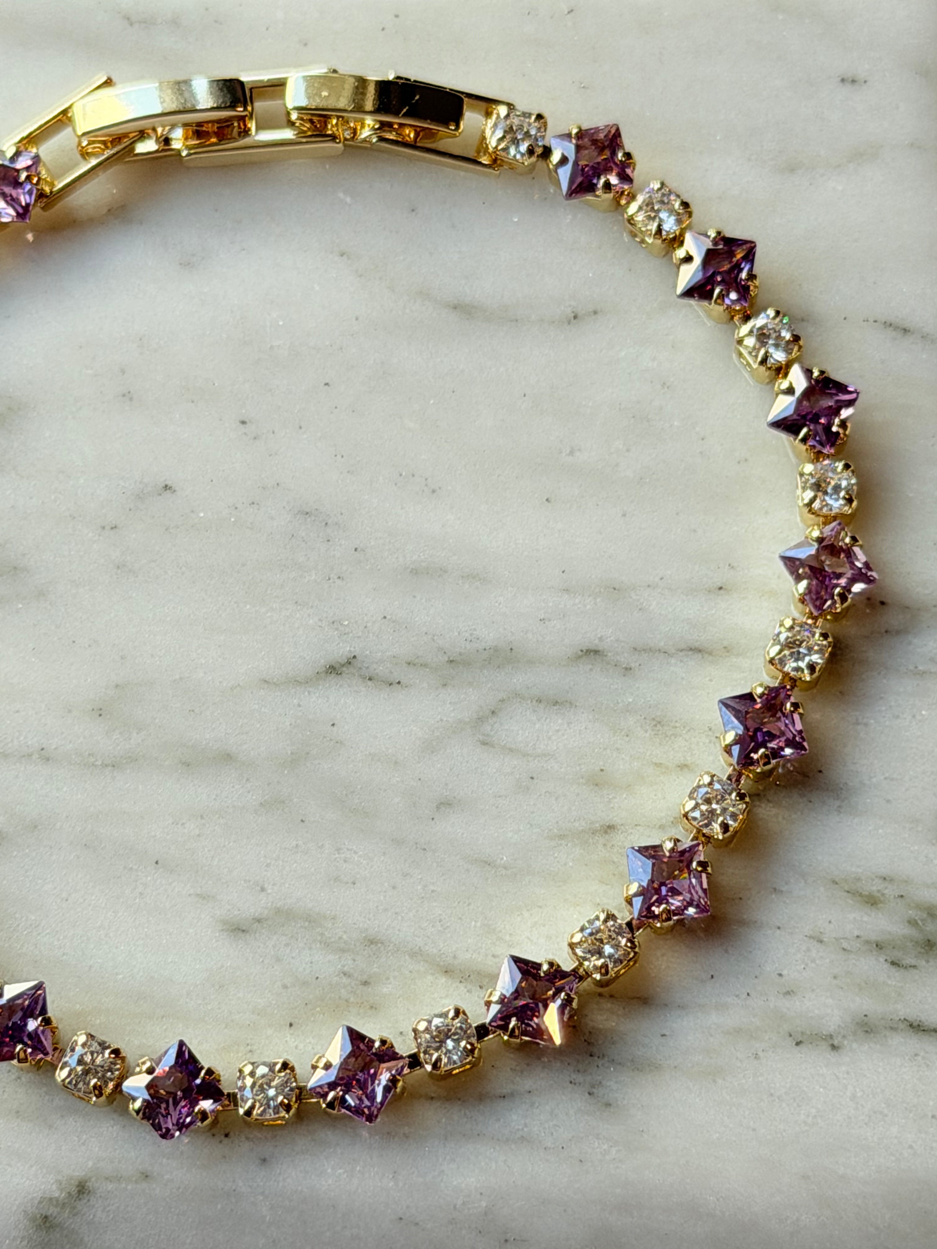 Pulsera tennis con zirconias lilas y transparentes