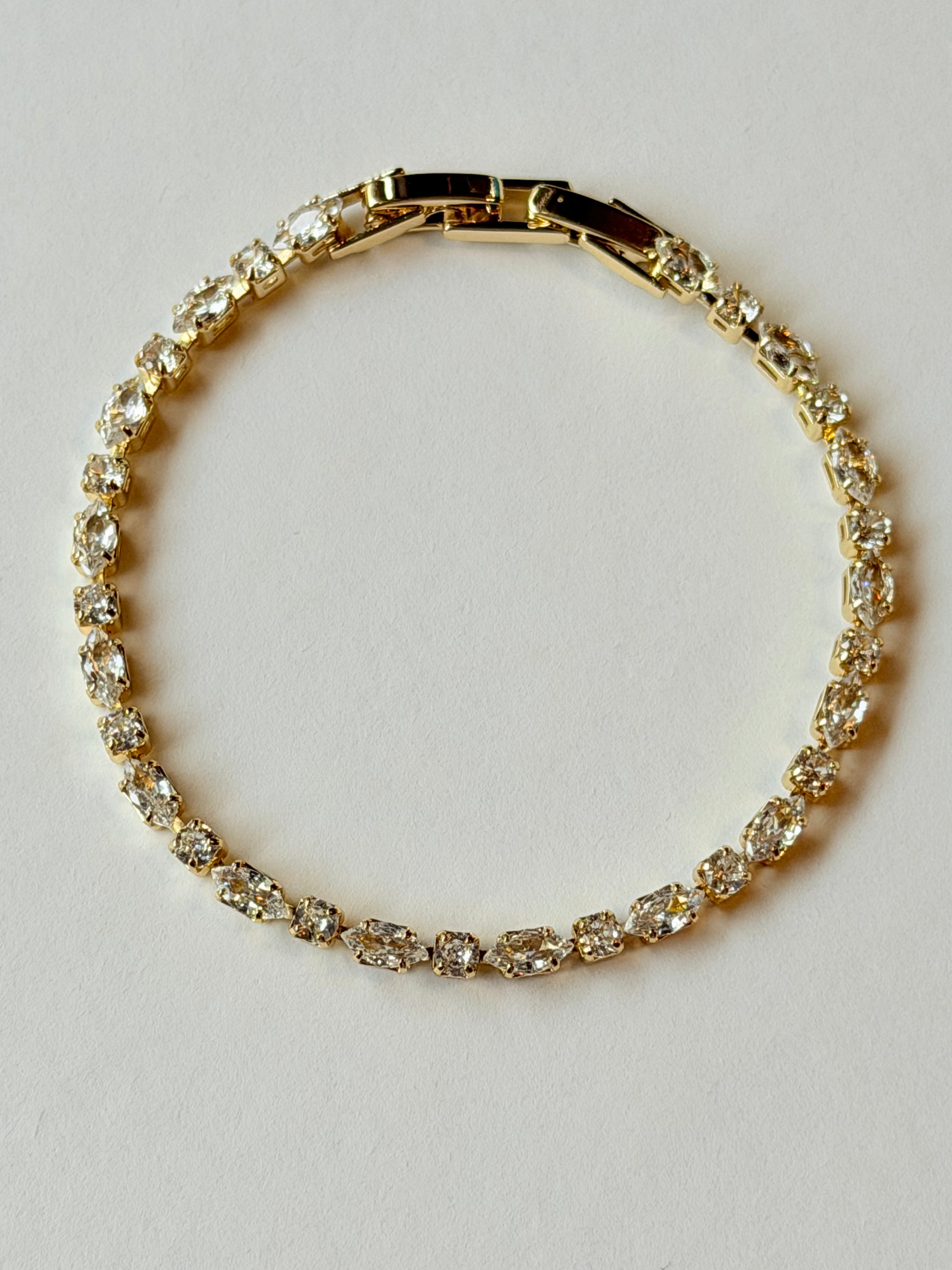Pulsera tennis dorada con zirconias