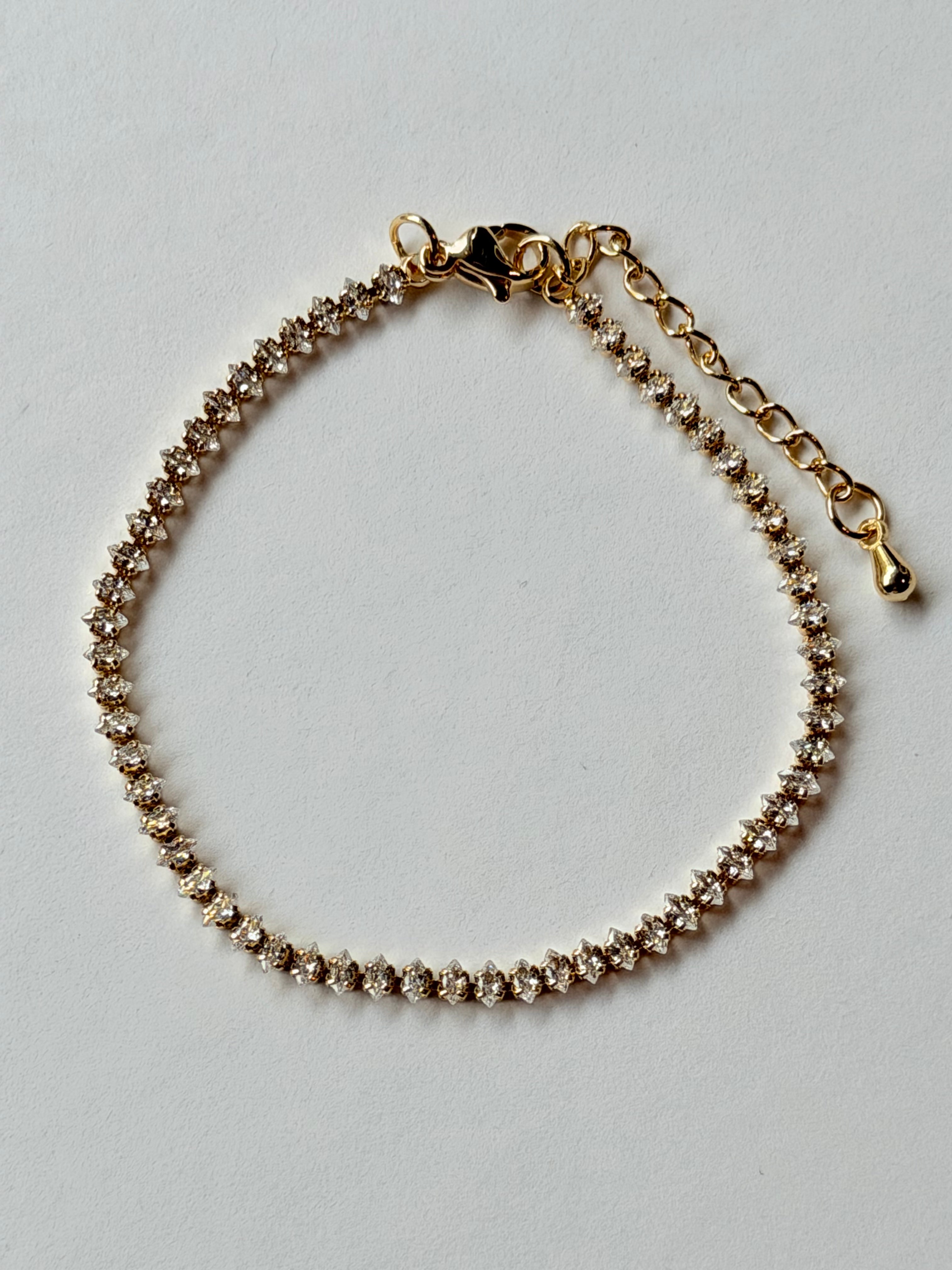 Pulsera tennis dorada con zirconias