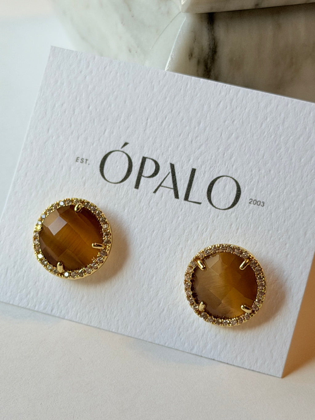 Broquel redondo de cristal con zirconias