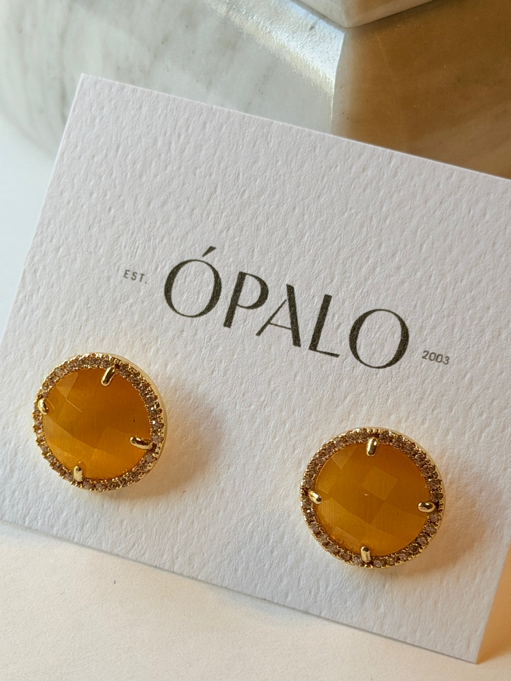 Broquel redondo de cristal con zirconias